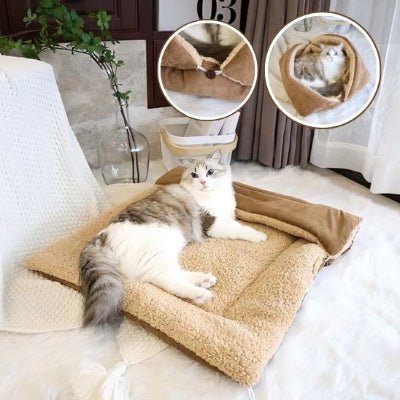 panier pour chat couche dessus